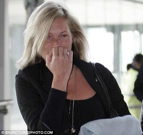 kate moss. Kate Moss shows her age as she