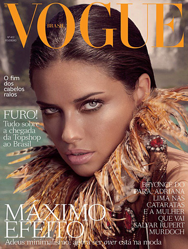 The criticized cover features an intensely tanned Adriana Lima wearing a big