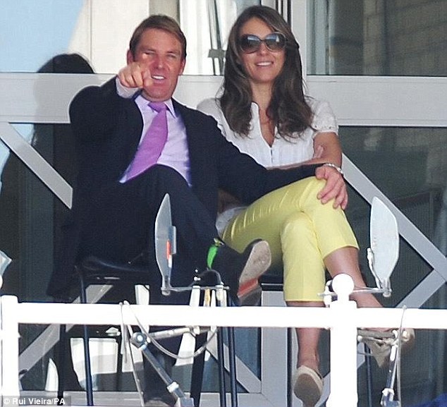 Elizabeth Hurley and Shane Warne, hot and heavy, at the cricket match