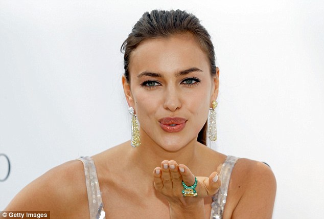 Kisses from Cannes! Irina Shayk channels a 1920’s flapper girl at photocall.