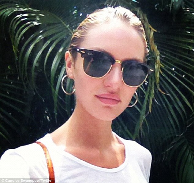 Candice Swanepoel, topless and loving it!