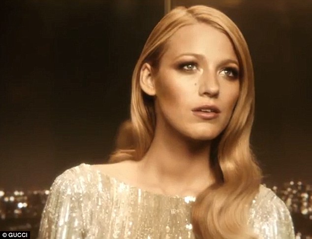 Golden girl Blake Lively shows off slender figure for new perfume ad