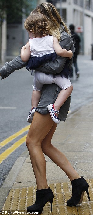 Abbey Clancy Crouch shows her fab legs again