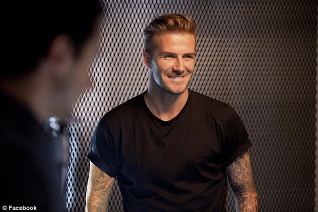 David Beckham strikes a pose and looks mighty fine