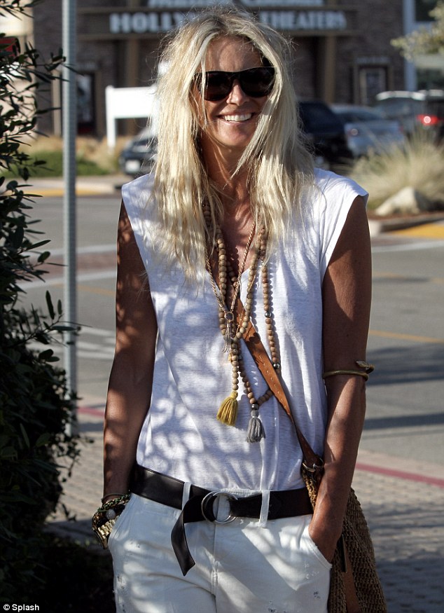 Elle Macpherson takes sunset stroll with beau Roger Jenkins