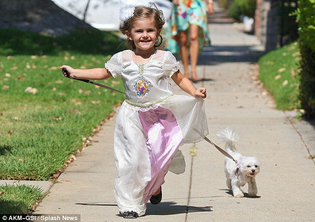 All the world’s a stage when it comes to walking the dog for Alessandra Ambrosio and daughter Anja