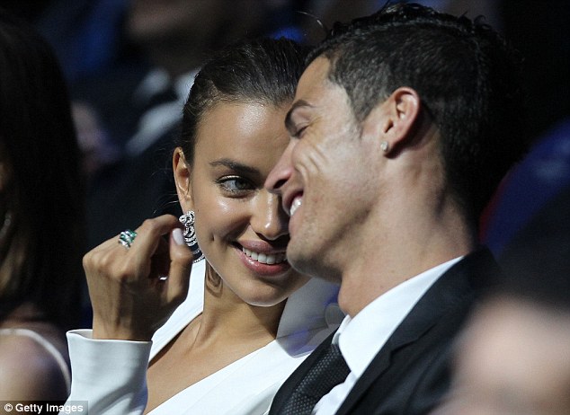 Irina Shayk goes braless for football event and is “smoking” hot