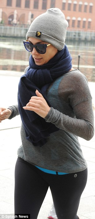 Jennifer Lopez goes jogging with boyfriend Casper Smart in cold Poland