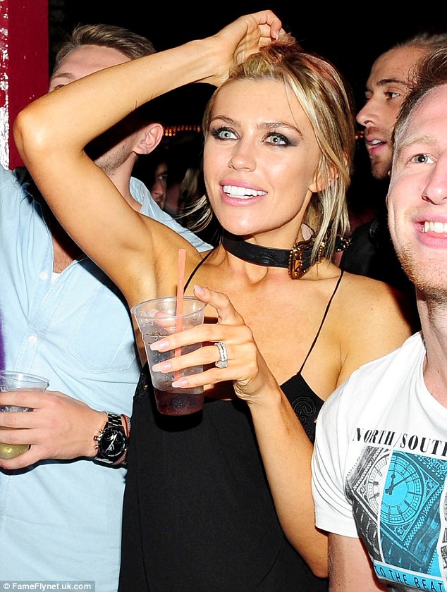 Abbey and Peter Crouch go wild at her brother’s gig