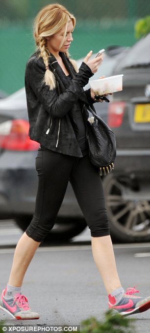 Abbey Crouch shows her schoolgirl side as she heads to the fitness centre