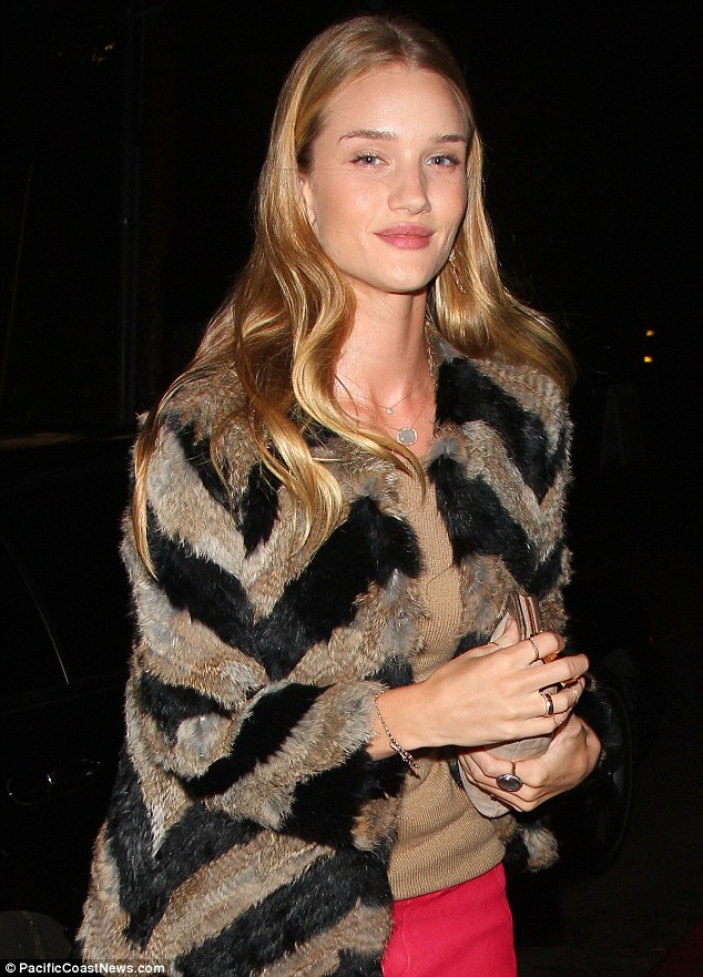 Rosie Huntington-Whiteley wears bright pink and still comes off a winner