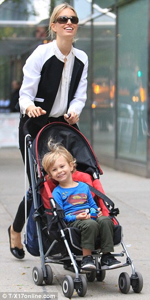 Czech supermodel, Karolina Kurkova looks great in leather pants