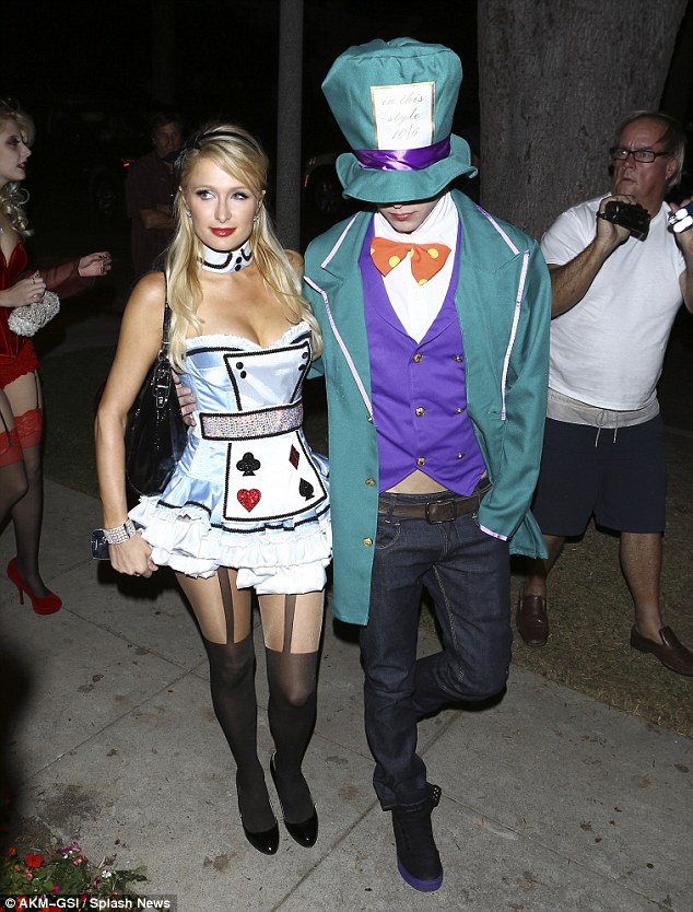 Paris Hilton tries out the “Alice in Wonderland” look a second time around for Halloween party