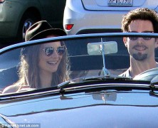 Adam Levine shows off his �other love.�
