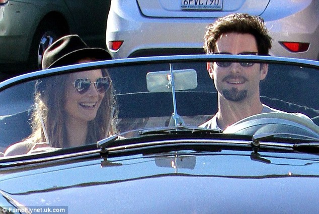 Adam Levine shows off his “other love.”