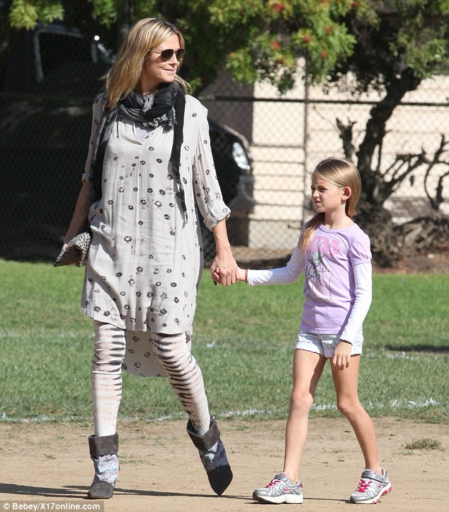 Heidi Klum mixes spots and stripes proving that even supermodels can have an off day
