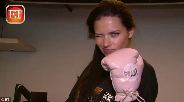 Adriana Lima belts it out to lose that weight