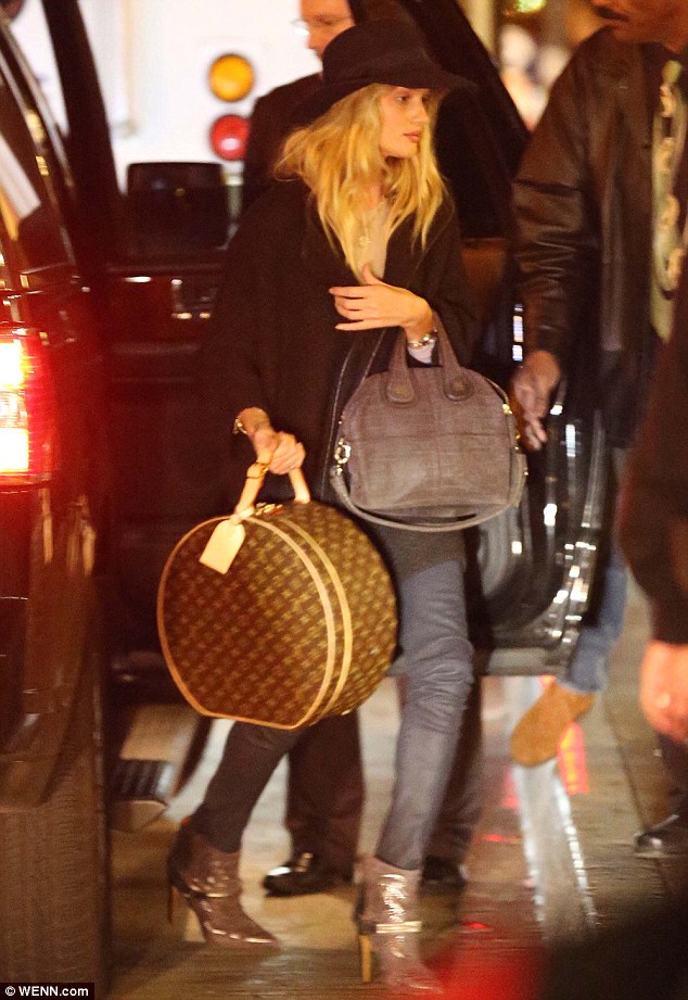 Rosie and boyfriend Jason leave LAX