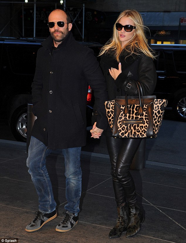 Rosie Huntington-Whiteley stands by her man