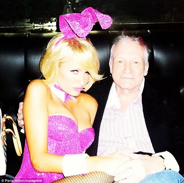 Paris Hilton dons a pink bunny costume for Easter