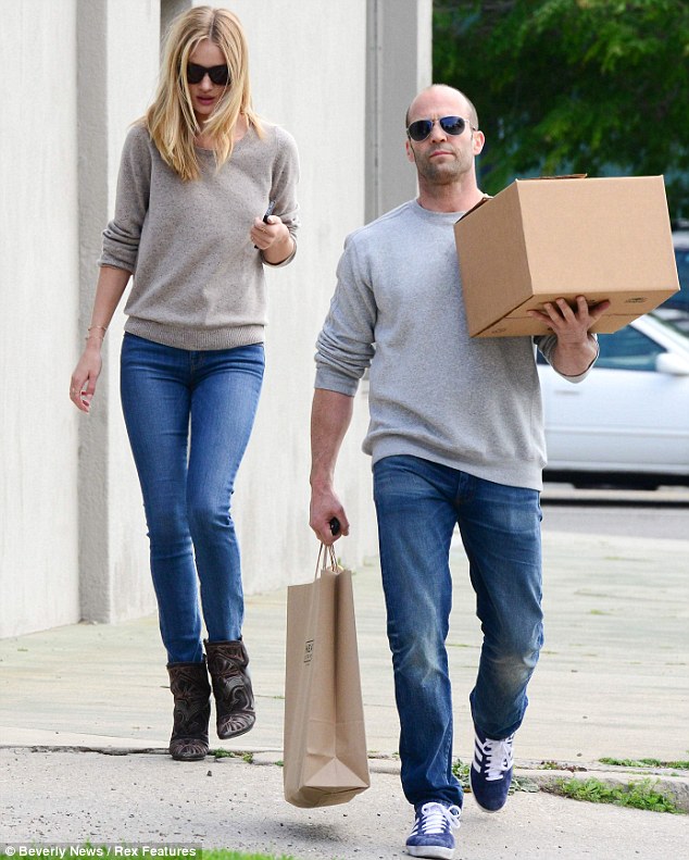 Rosie Huntington-Whiteley and beau opt for matching ensembles