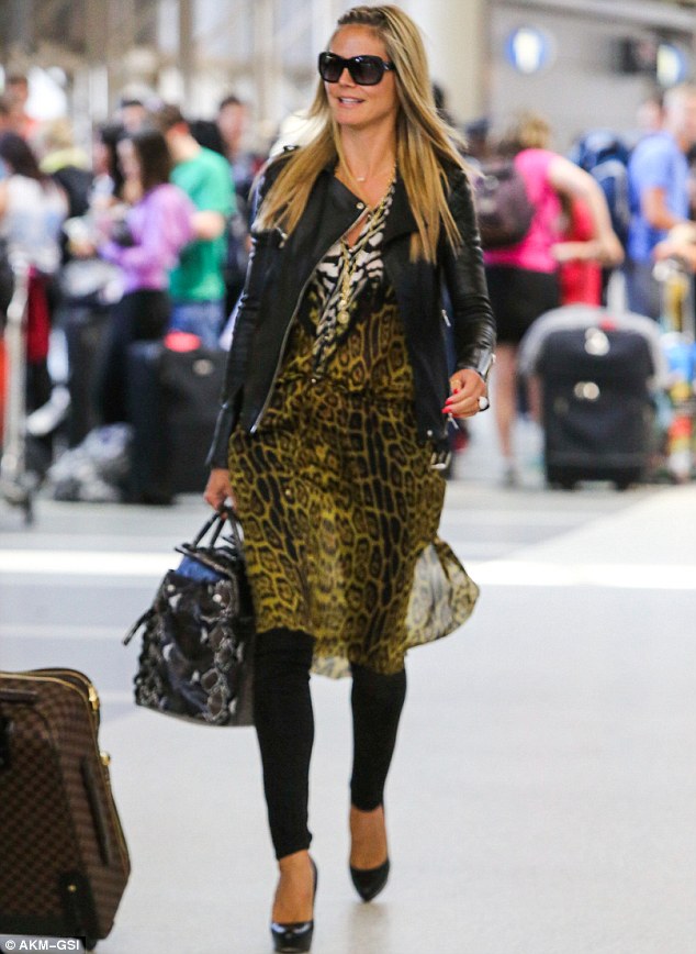 Heidi Klum struts her stuff through LAX