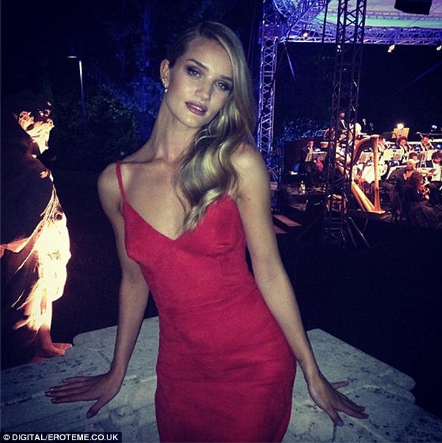 Rosie Huntington-Whiteley is the lady in red!