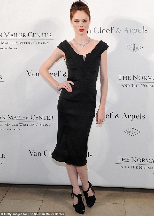 Coco Rocha lets the cropped hair and diamond necklace do all the talking!