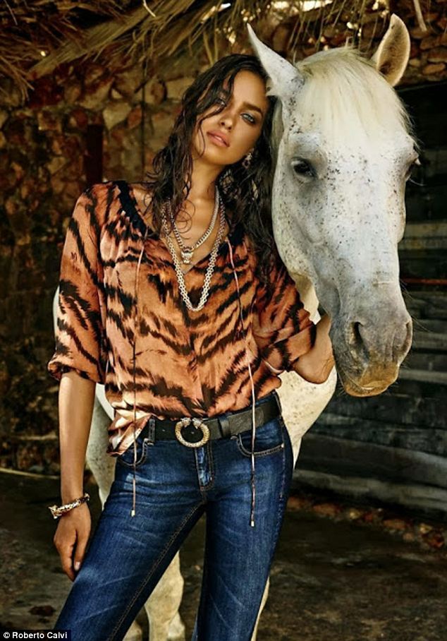 Irina Shayk lets the ‘tiger out of the tank’ as she smoulders for Roberto Cavalli