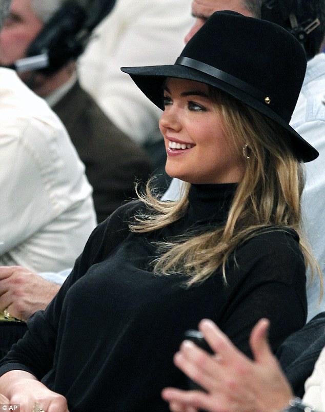 Kate Upton covers up for Knicks game