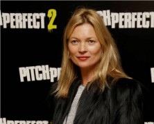 Kate Moss Escorted Off Plane in London